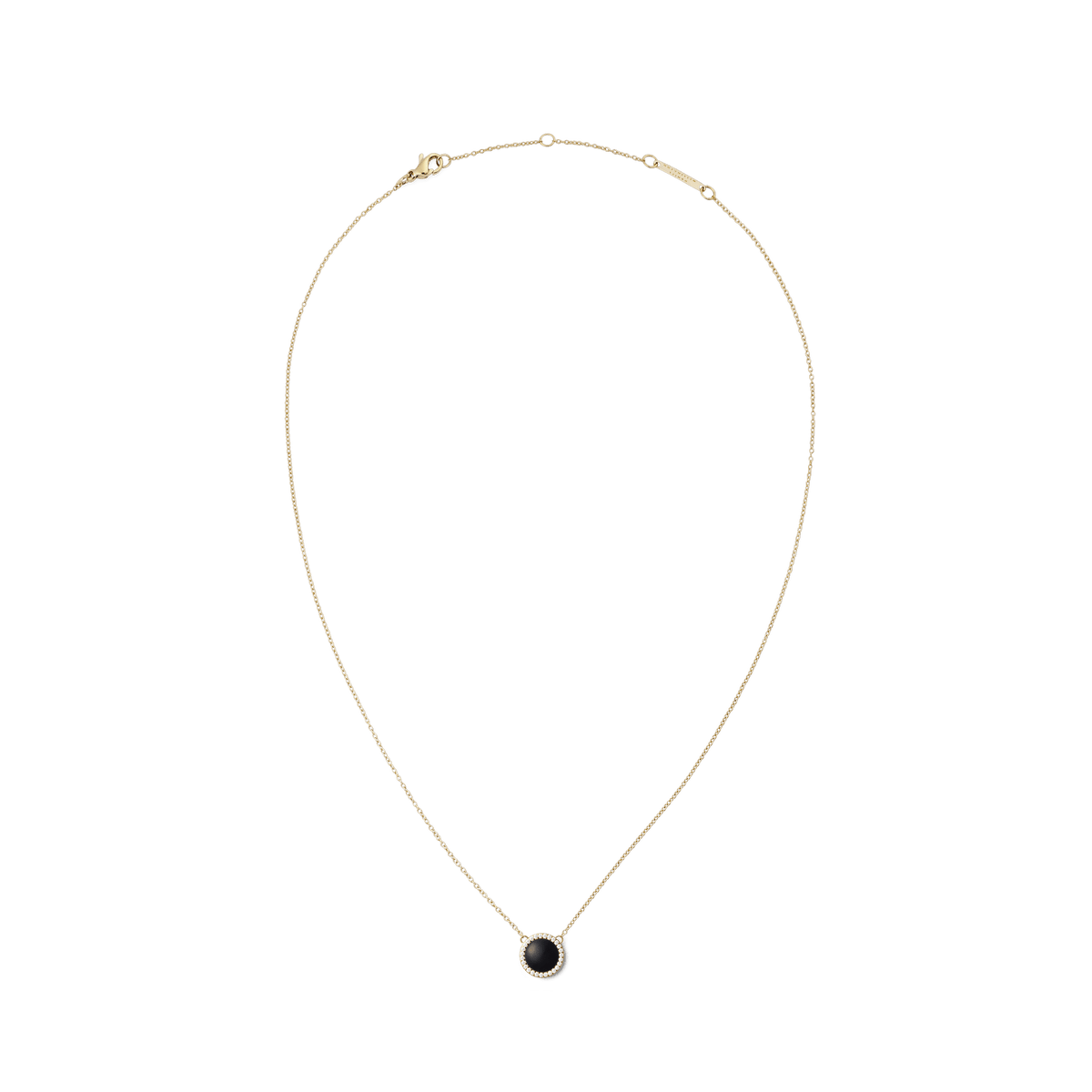 Gold necklace with a circular black agate pendant and white cubic zirconia accents on a fine adjustable chain.