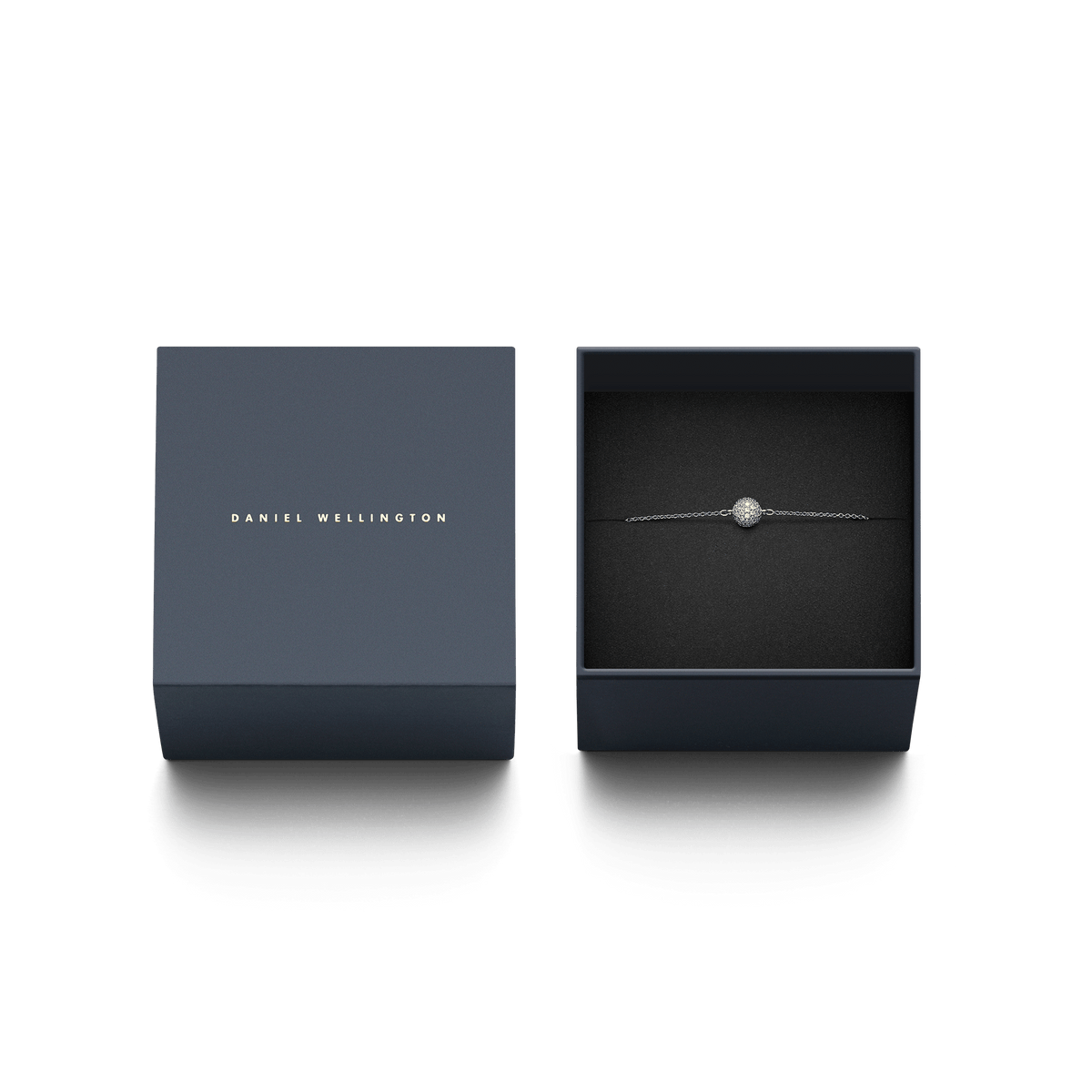 Pavé Crystal Pendant Bracelet Silver displayed in an open Daniel Wellington gift box with the matching branded lid beside it.