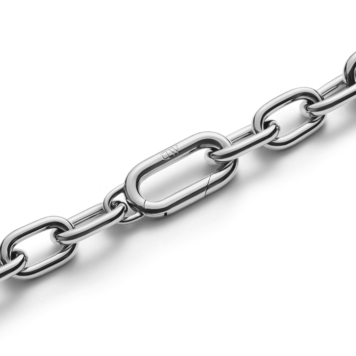 Detail of the Crystal Link Bracelet Silver showing the polished stainless steel chain and secure spring gate clasp with subtle branding.