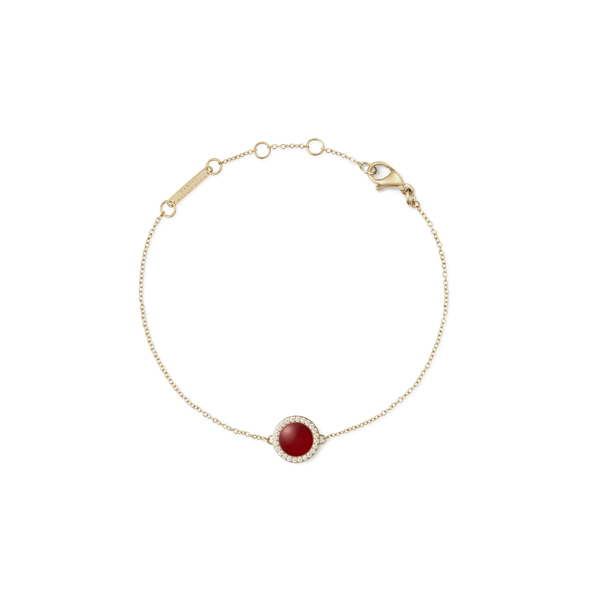 Delicate gold bracelet with central red agate stone, cubic zirconia halo, and adjustable chain by Daniel Wellington.