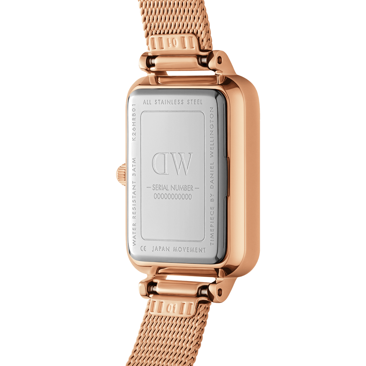 Back view of the Quadro Roman Numerals Melrose watch showing its stainless steel caseback, engraved details, and rose gold mesh strap.
