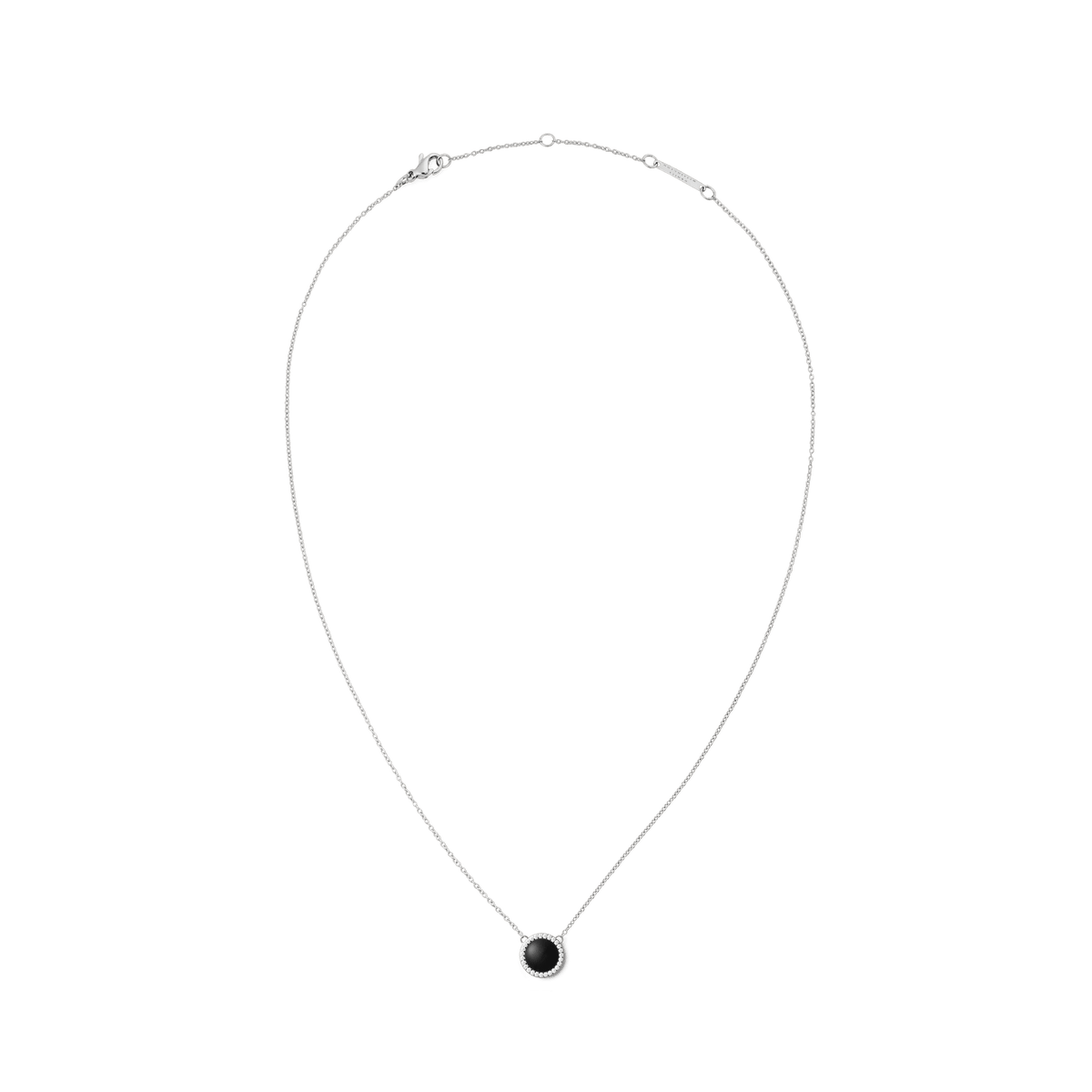 Silver necklace with a domed black agate pendant, haloed by white crystals on a fine adjustable chain.