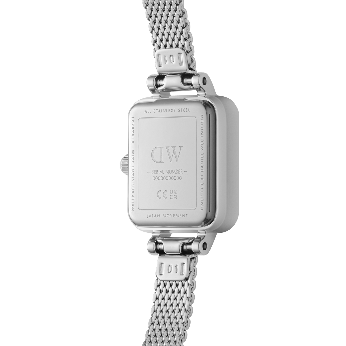 Back view of Quadro Mini Lumine Bezel Silver watch showing stainless steel case, engraved details, and mesh strap.