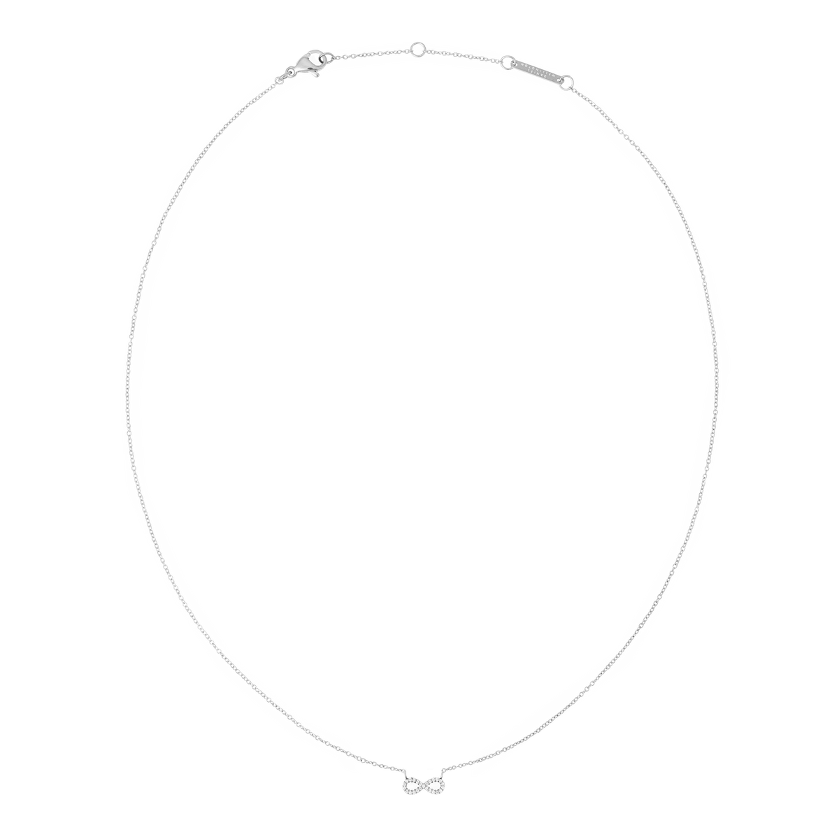 Delicate silver necklace featuring an infinity symbol pendant set with sparkling white cubic zirconia crystals on a fine adjustable chain.