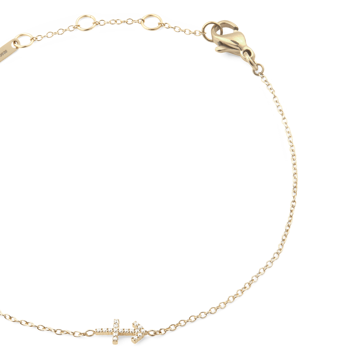 Gold chain bracelet with an adjustable fit, featuring a crystal-encrusted zodiac symbol pendant and a lobster clasp fastening.