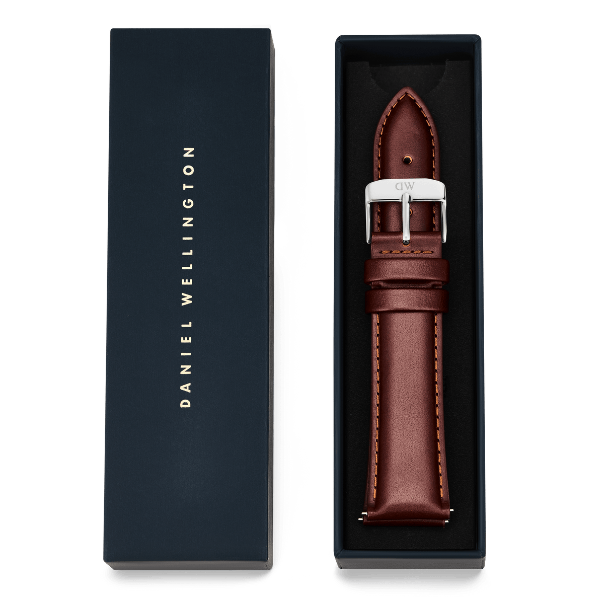 Tapered St Mawes Strap Silver presented in a navy Daniel Wellington gift box, featuring rich brown genuine leather, a polished silver buckle, and refined stitching for a classic, elegant look.