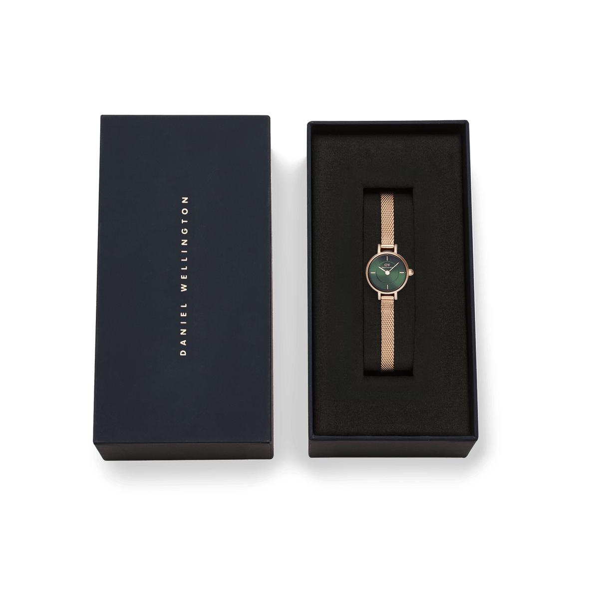 Petite Mini Emerald Melrose watch with an emerald green dial and rose gold mesh strap, elegantly presented in a black Daniel Wellington gift box.
