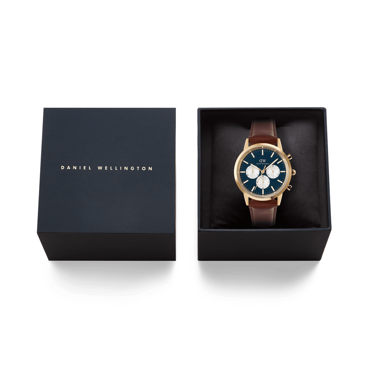Daniel Wellington Iconic Chronograph St Mawes Arctic Panda Gold watch with a blue dial and brown leather strap, presented in an elegant black gift box with gold branding.