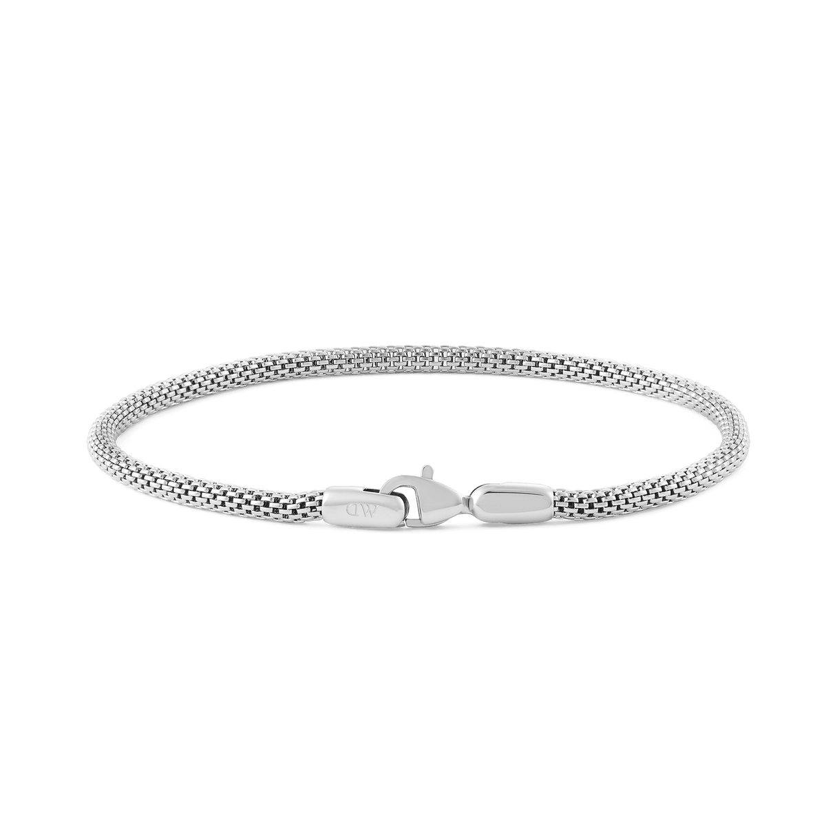 Slim sterling silver mesh bracelet with a polished finish and secure lobster clasp, inspired by classic watch straps.