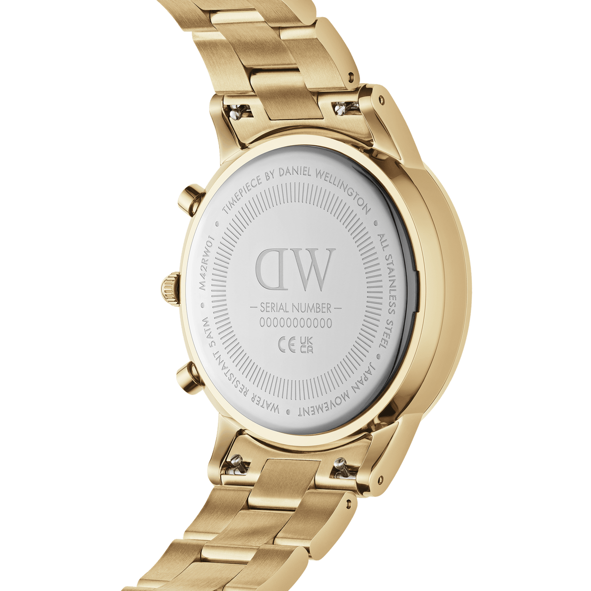 Close-up of the back of the Iconic Chronograph Link Onyx G gold watch, showing the engraved Daniel Wellington branding, stainless steel case, and polished gold link bracelet.