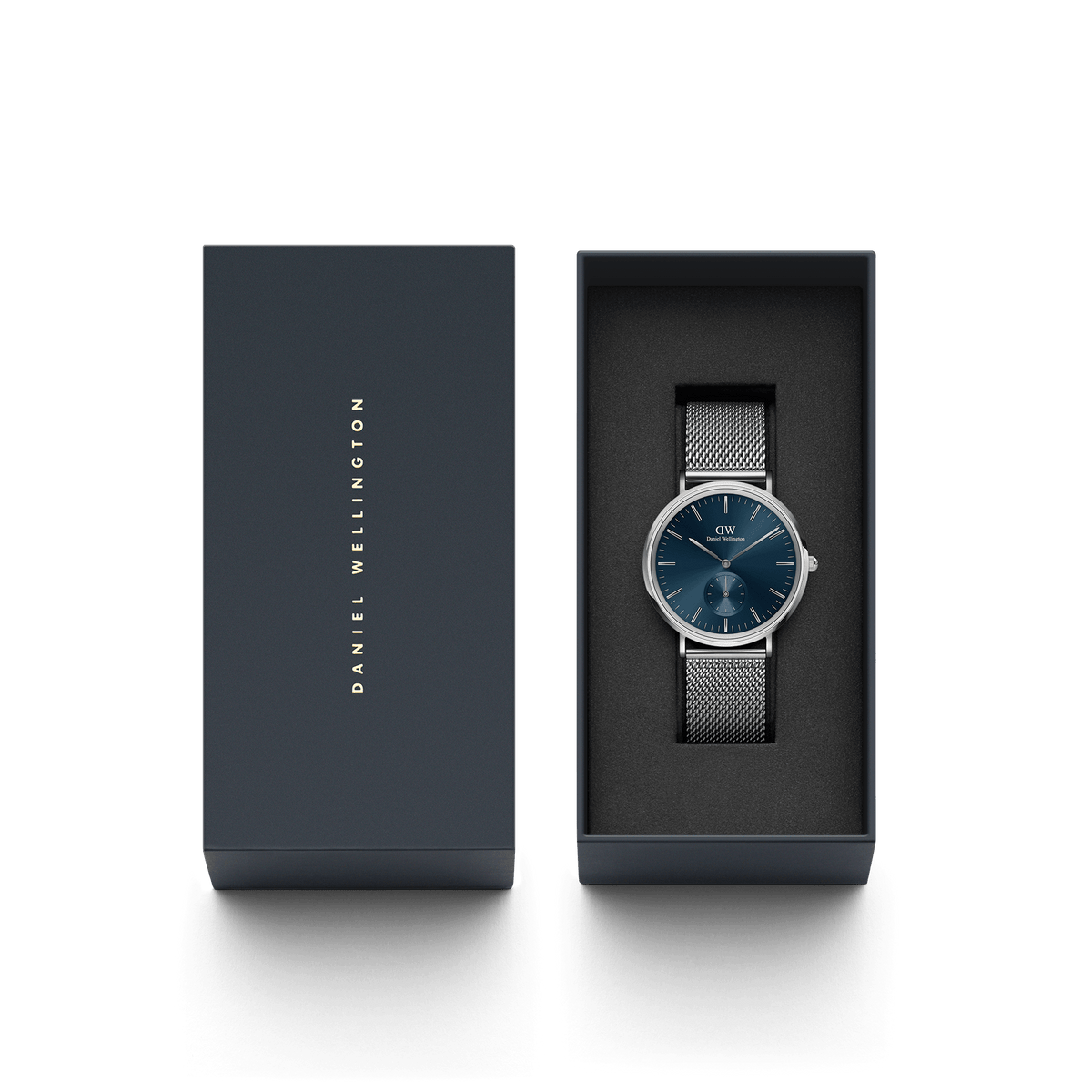 Classic Multi-Eye Sterling Arctic watch with a blue dial and silver mesh strap, presented in an elegant Daniel Wellington gift box.