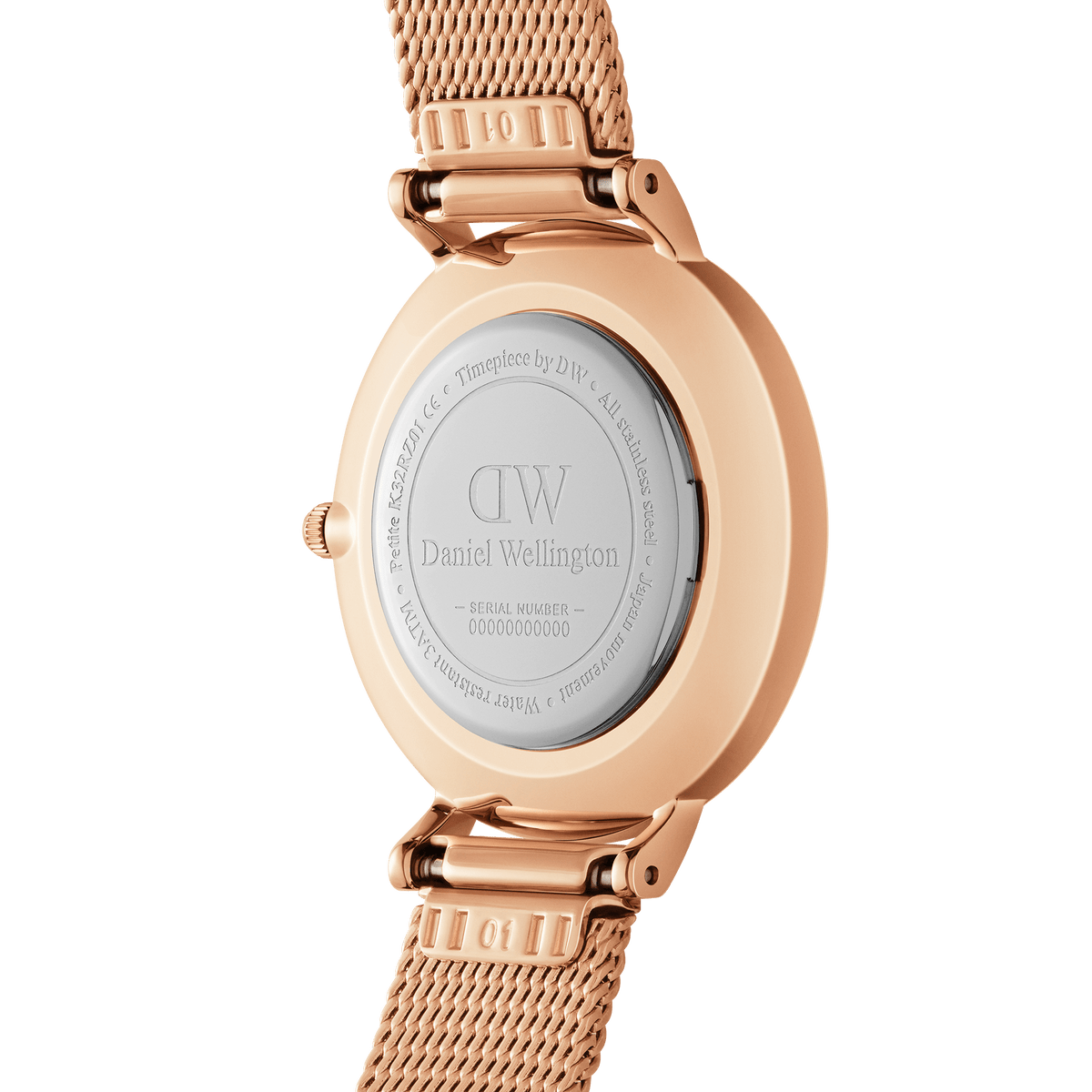 Back view of Petite Roman Numerals Melrose watch showing engraved case and rose gold mesh strap by Daniel Wellington.