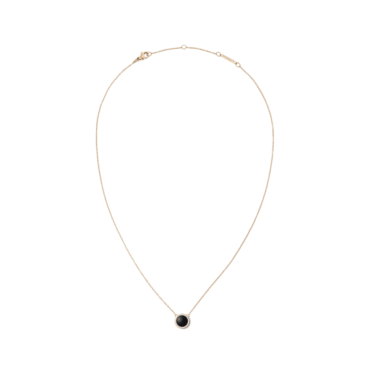 Rose gold necklace with a round black agate pendant and white cubic zirconia accents on a fine adjustable chain.