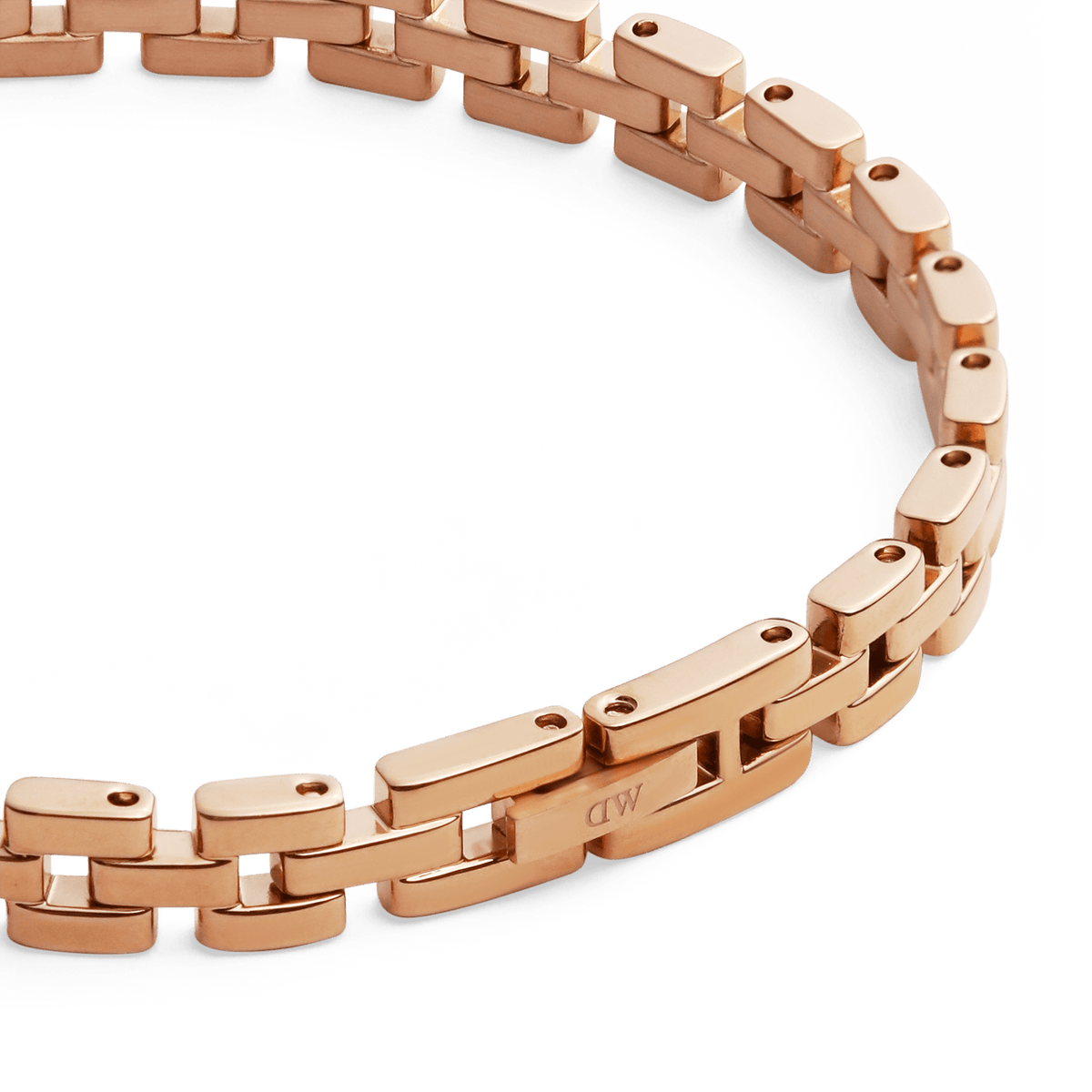 Detail view of the 3-Link Bracelet Rose Gold, showing the engraved DW clasp and the elegant, polished three-link construction.