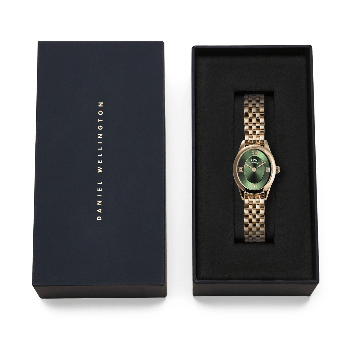 Daniel Wellington Ophelia Mini Emerald Gold watch with an oval emerald green dial and gold link bracelet, elegantly presented in a navy gift box with gold branding.