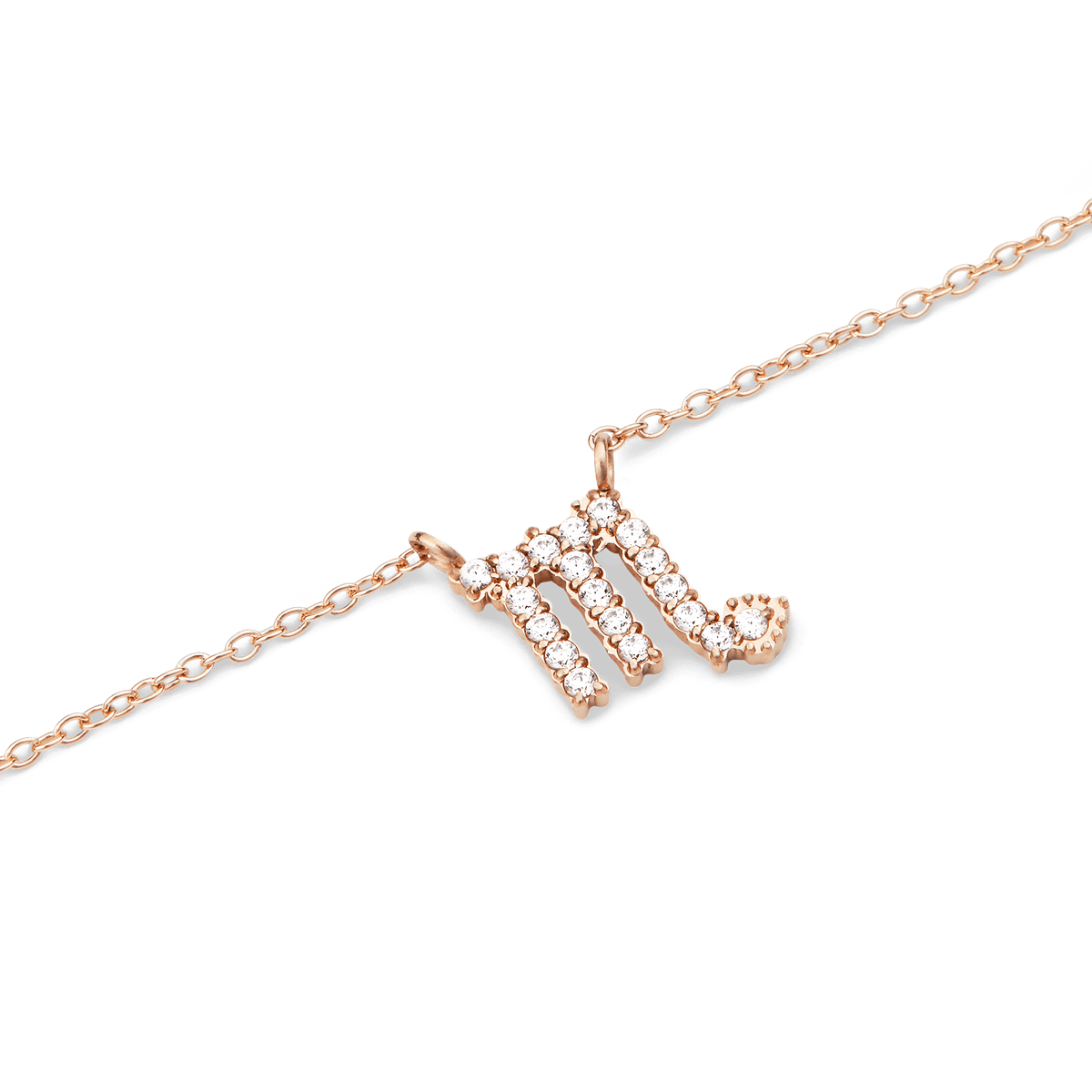 Delicate rose gold chain necklace featuring a Scorpio zodiac pendant adorned with hand-set sparkling crystals.