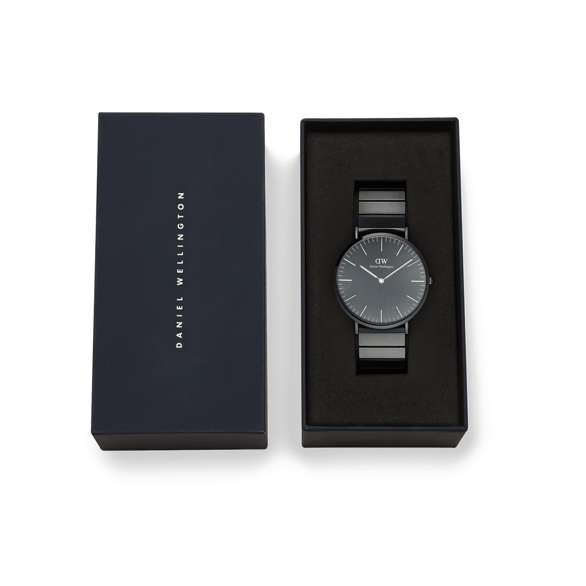 Classic Piano Link Onyx Unitone watch with a brushed black dial and piano link strap, presented in an elegant Daniel Wellington gift box.