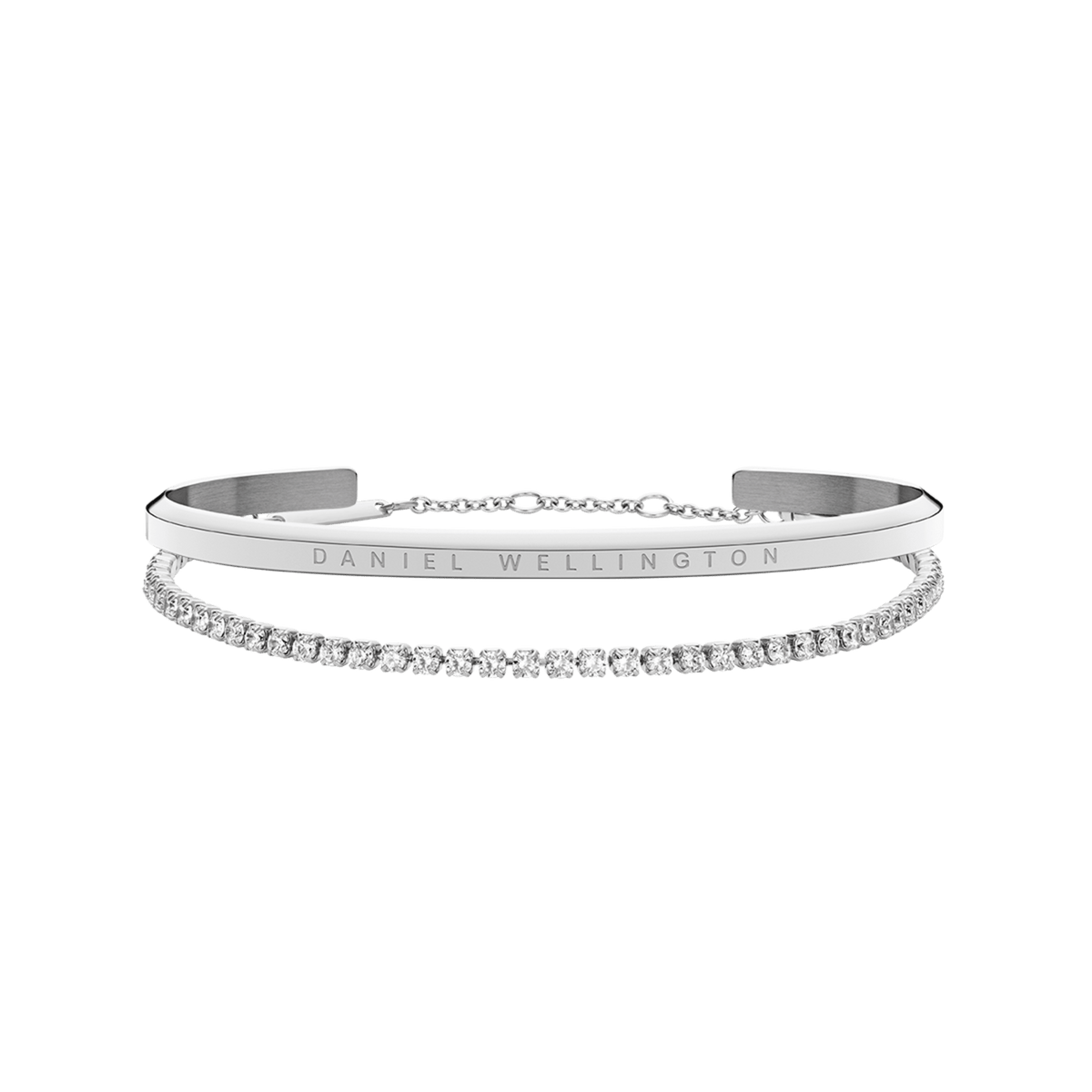 Classic & Tennis Bracelet Silver set featuring a polished silver cuff engraved with the Daniel Wellington name, paired with a sparkling tennis bracelet adorned with clear stones, displayed together for a refined, elegant look.