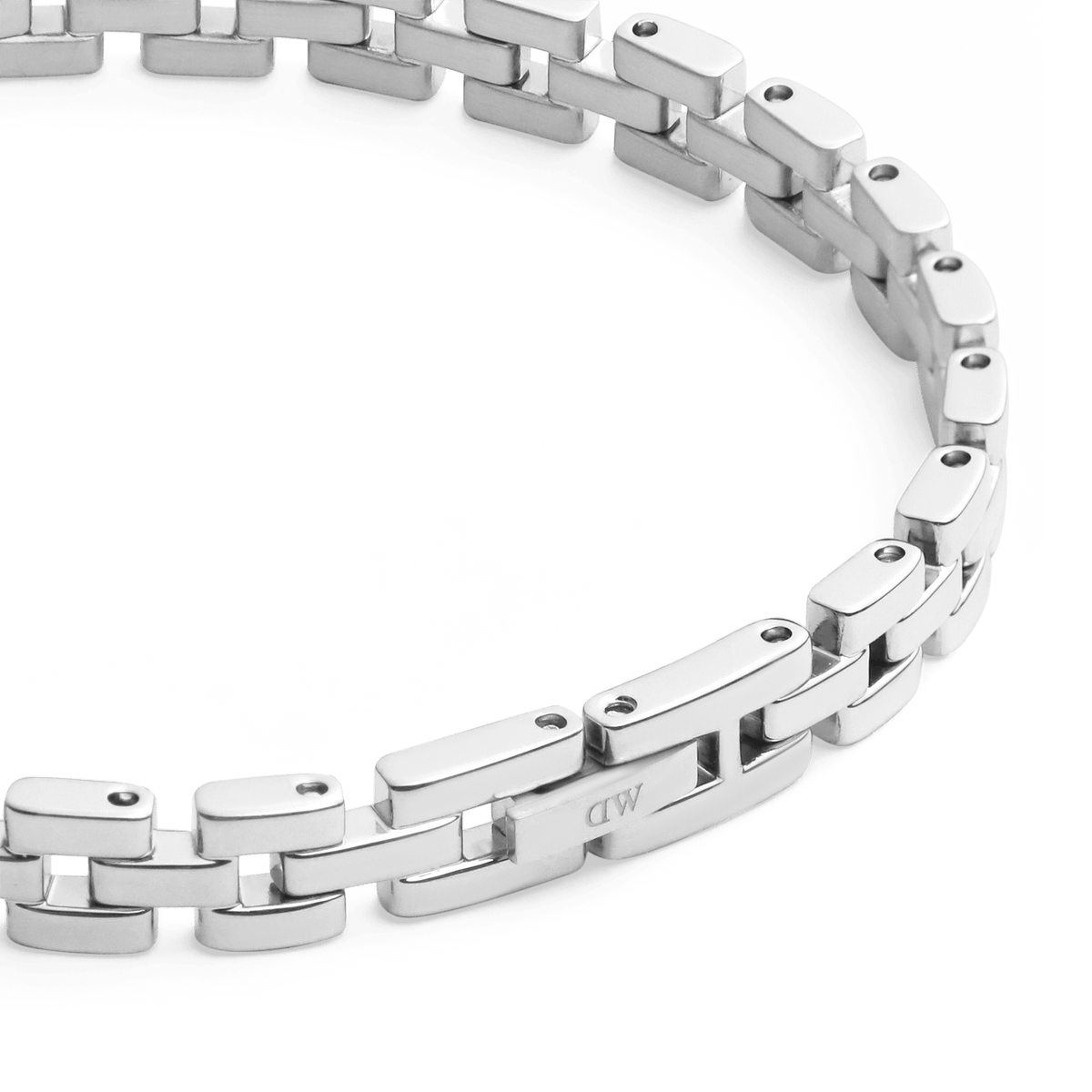 Detail view of the 3-Link Bracelet Silver showing the polished stainless steel links and subtle engraved DW logo.