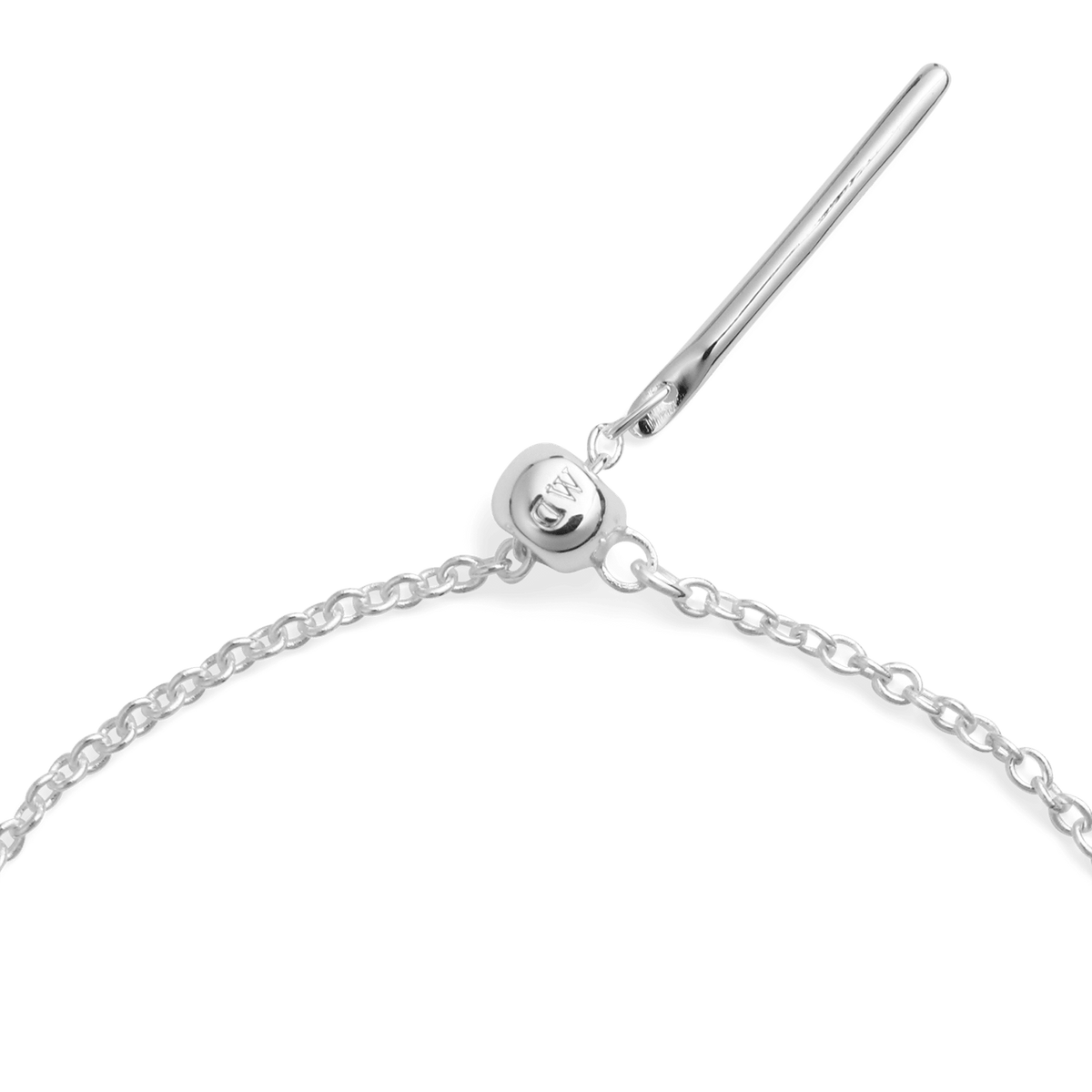 Close-up of the Charms Chain Necklace in S925 sterling silver, highlighting the adjustable sliding clasp with discreet DW engraving and delicate oval links.