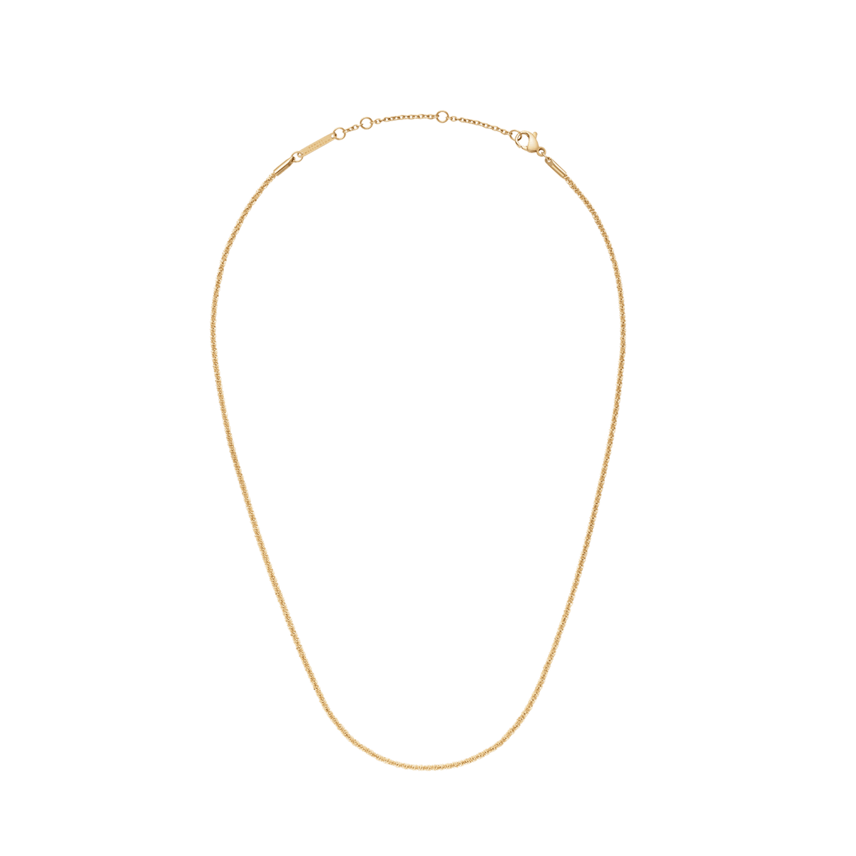 Twisted Chain Necklace G featuring a slim, rope-inspired gold chain with a subtle textured finish and secure clasp.