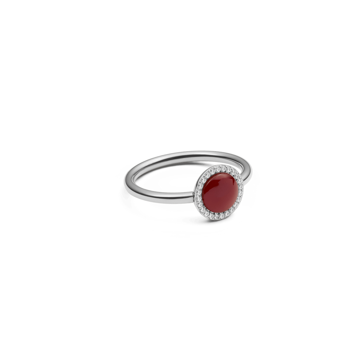 Audrey Ring in silver with round red agate centre and pavé cubic zirconia halo, slim band, modern elegant design.