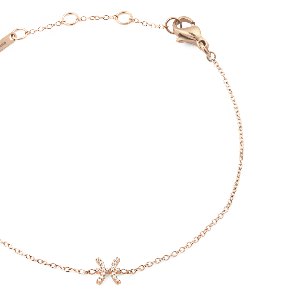 Delicate rose gold chain bracelet with an adjustable clasp, featuring a crystal-set Pisces zodiac pendant as the focal point.