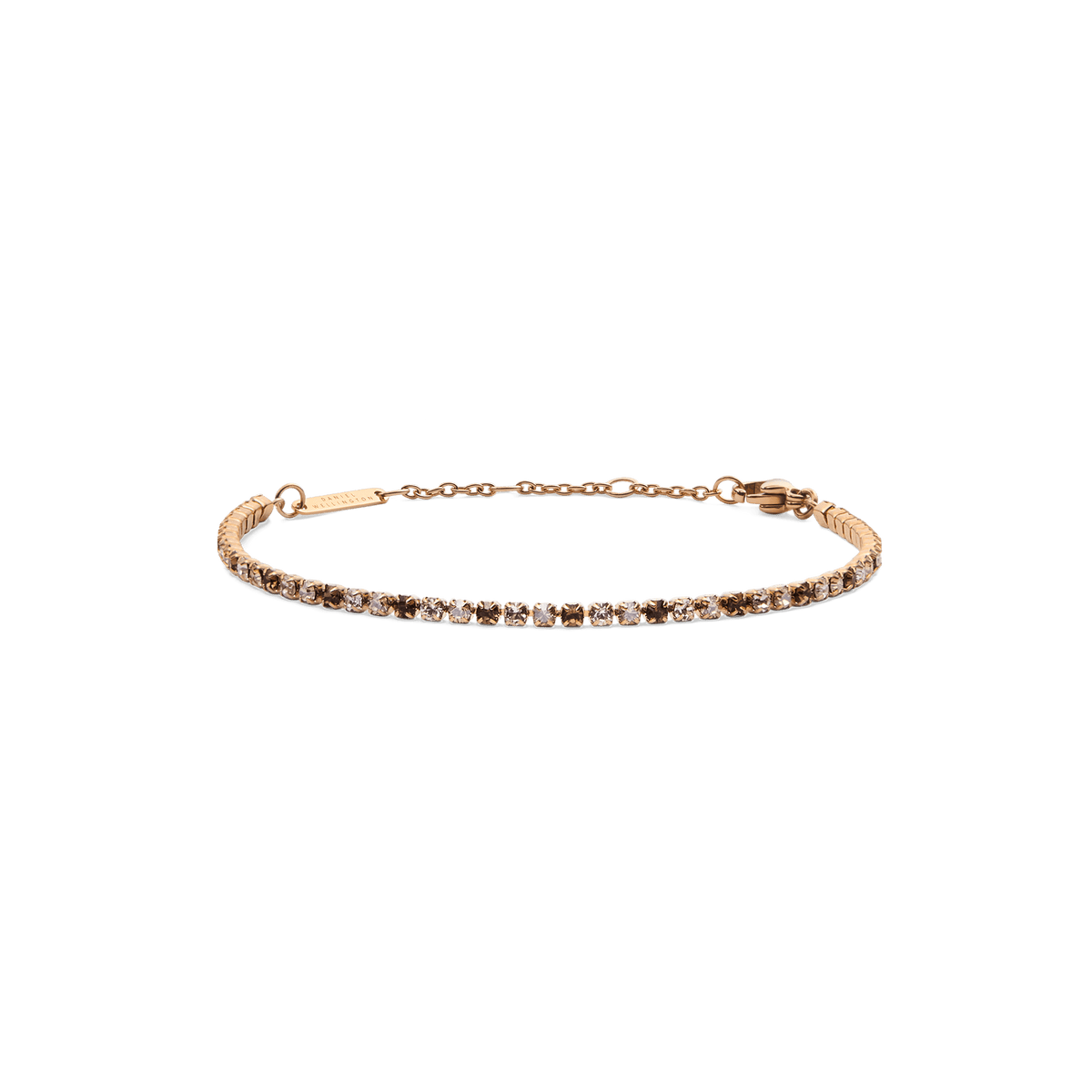 Slim rose gold tennis bracelet featuring a row of honey-toned Preciosa crystals in a delicate gradient, finished with an adjustable chain and secure lobster clasp.