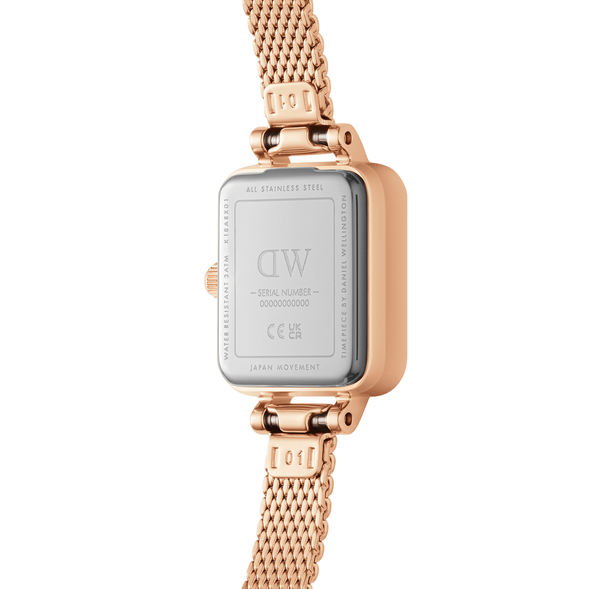 Back view of the Quadro Mini Lumine Bezel Rose Gold watch showing the stainless steel case, engraved details, and rose gold mesh strap.