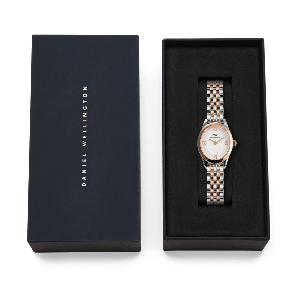 Ophelia Mini Two-Tone Rose Gold watch with an oval white dial and silver and rose gold bracelet, elegantly presented in a black Daniel Wellington gift box.