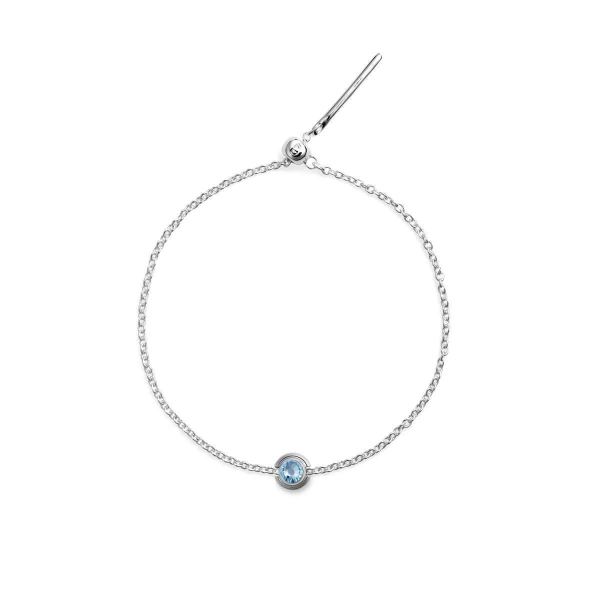 Delicate sterling silver bracelet featuring a round blue topaz-coloured crystal charm set in a minimalist bezel.
