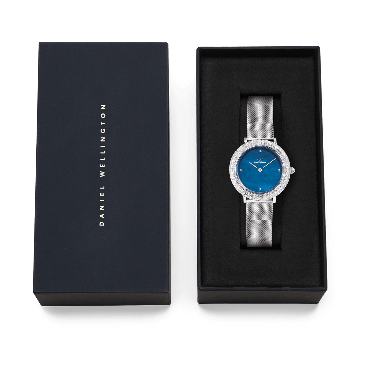 Crystalline Bezel Sterling Blue ladies watch with blue dial and mesh strap, presented in a Daniel Wellington gift box.