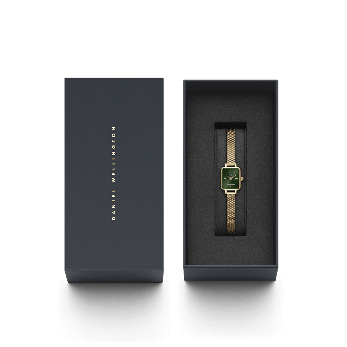 Quadro Mini Evergold Emerald gold women’s watch with emerald green dial, presented in a Daniel Wellington gift box.