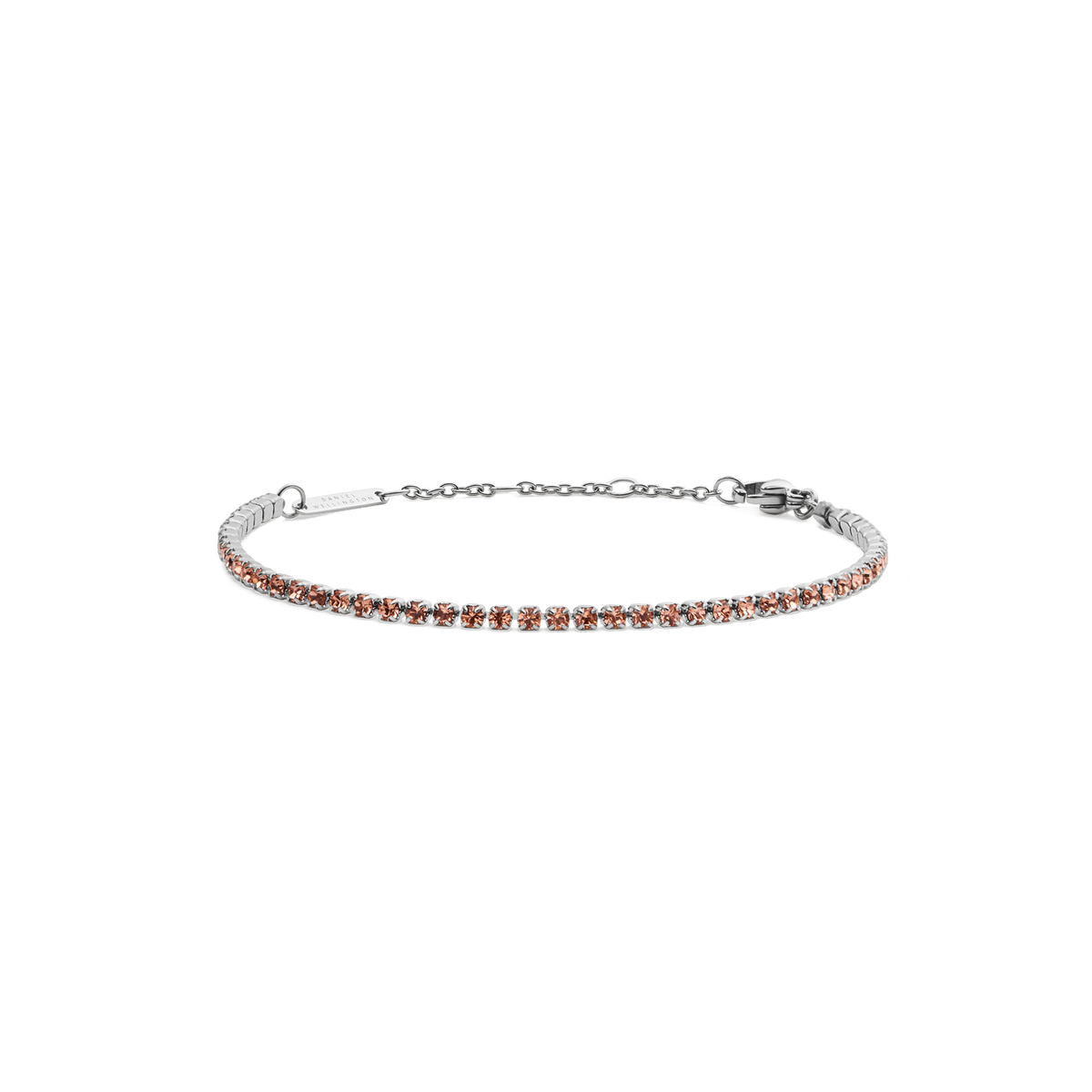Slim silver tennis bracelet featuring a row of apricot-coloured Preciosa crystals, with an adjustable chain and secure lobster clasp.