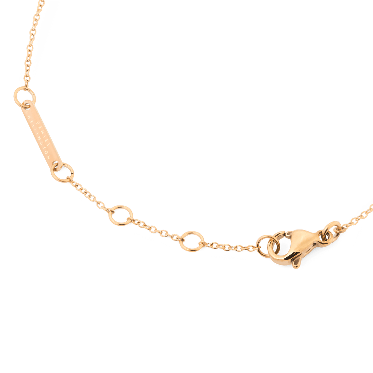 Detail of the Mirelle Star Bracelet Rose Gold showing the adjustable rose gold chain with multiple sizing loops, a secure lobster clasp, and a discreet branded tag.
