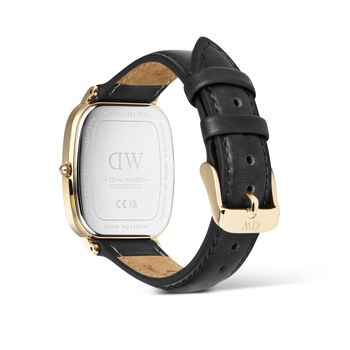 Rear view of the Marlon Sheffield Linen Gold watch by Daniel Wellington, showing the engraved stainless steel case back, gold pin buckle, and black genuine leather strap.