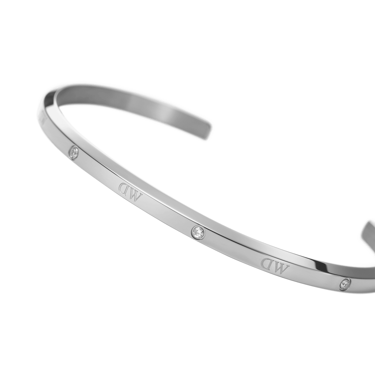 Classic Lumine Bracelet S in polished silver-tone stainless steel, featuring a slim open cuff design with six sparkling crystals and subtle engraved detailing.