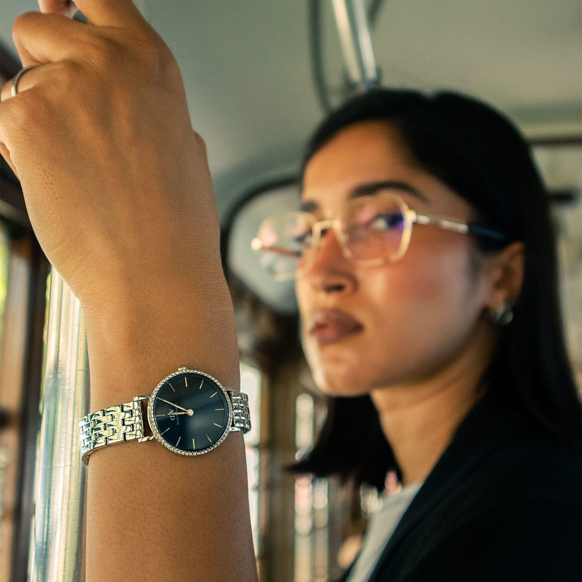 Petite Lumine Bezel 5-Link Arctic S silver women’s watch with blue dial and crystal bezel, styled on wrist in everyday setting.
