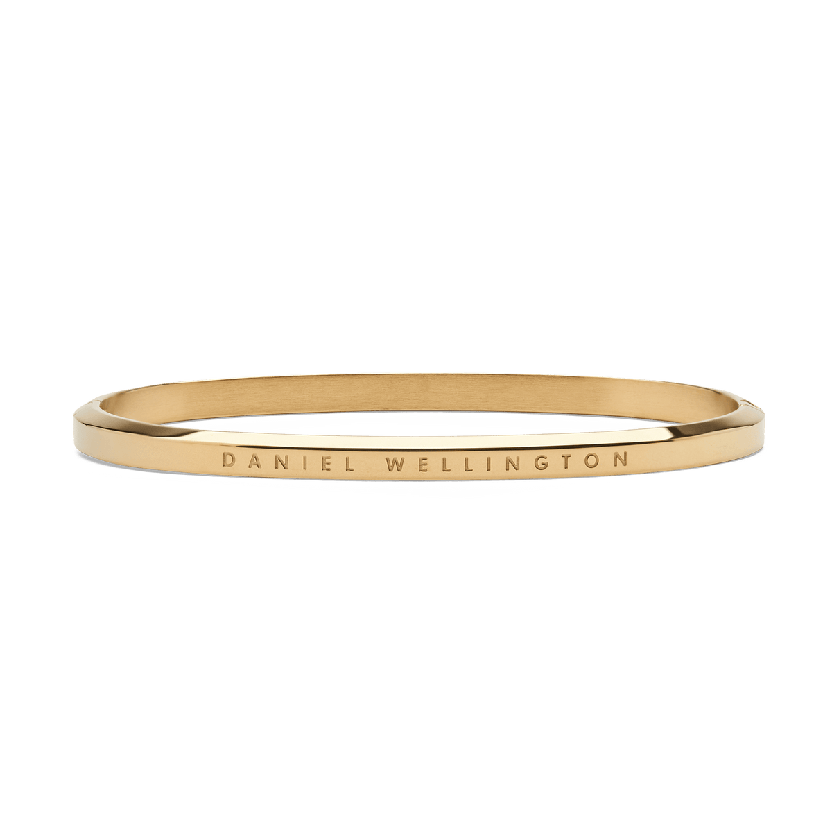 Slim gold Daniel Wellington bangle crafted from polished stainless steel, featuring minimalist engraved branding and a smooth, elegant finish.