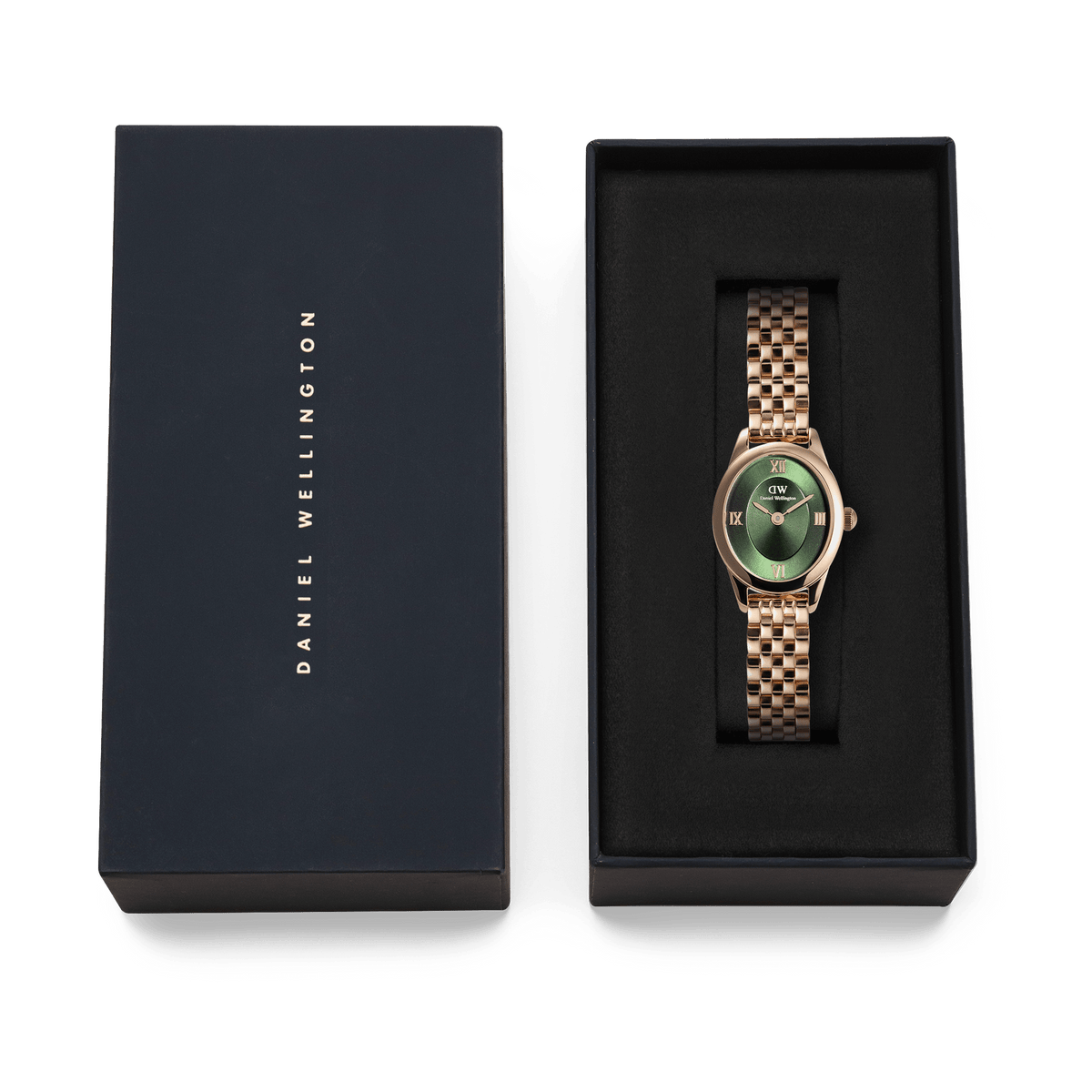 Ophelia Mini Emerald Rose Gold watch with an emerald green dial and rose gold beans link bracelet, elegantly presented in a black Daniel Wellington gift box.