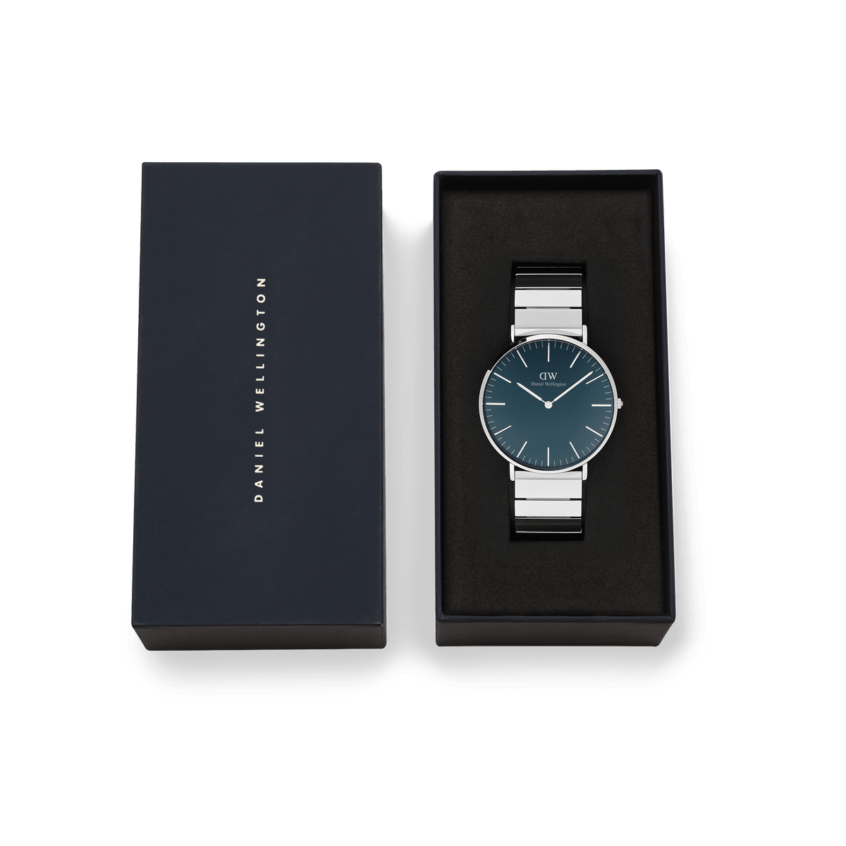Classic Piano Link Arctic Silver watch with a brushed arctic blue dial and silver piano link strap, presented in an elegant black Daniel Wellington gift box.
