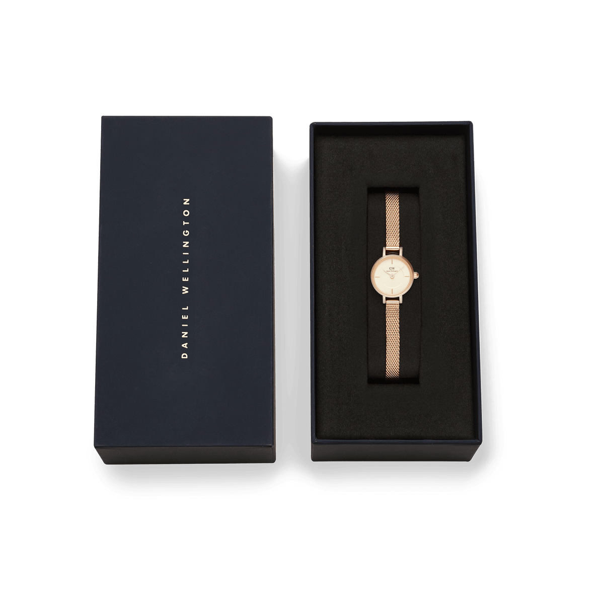Petite Mini Champagne Melrose watch with a rose gold mesh strap presented in an elegant navy Daniel Wellington gift box.