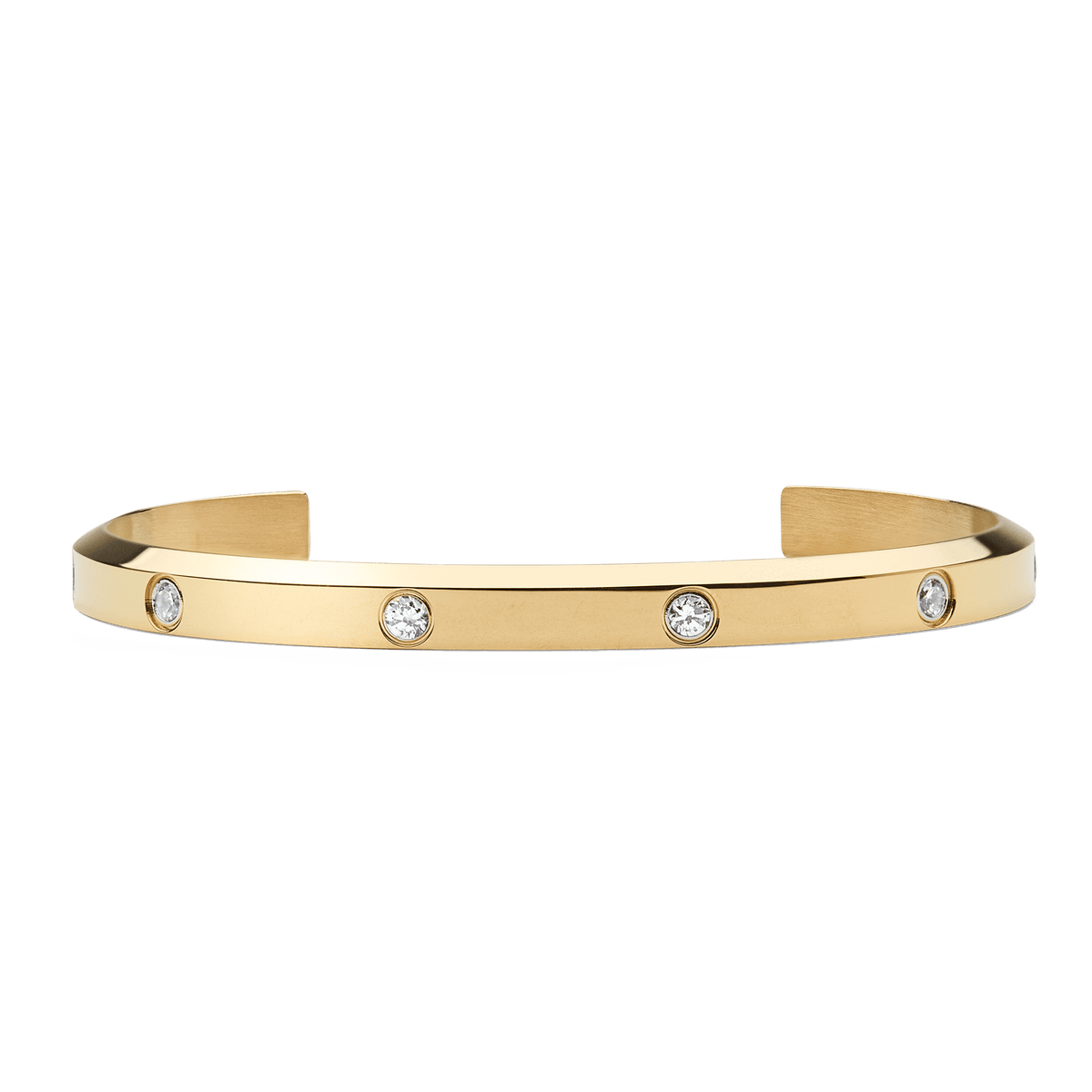 Polished gold cuff bracelet with a minimalist open design, featuring eight evenly spaced cubic zirconia crystals set along the band for a refined and elegant look.