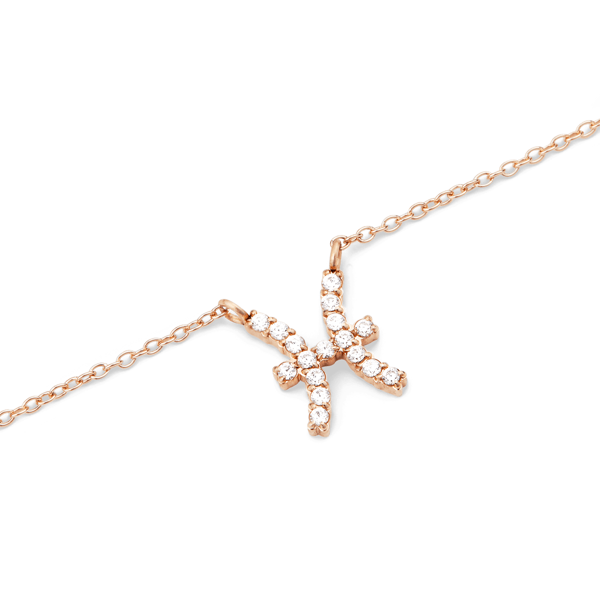 Rose gold chain necklace featuring a Pisces zodiac pendant adorned with hand-set sparkling crystals.