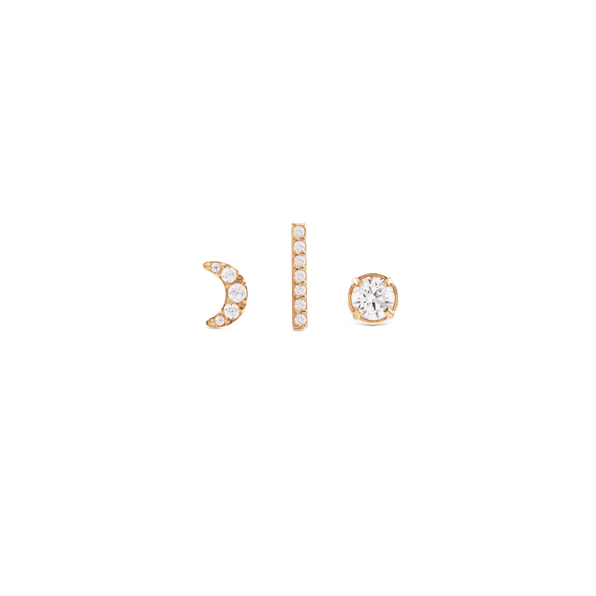 Set of three gold-plated earrings featuring a crescent moon, a vertical bar, and a round crystal stud, each adorned with sparkling crystals and designed for versatile, layered styling.