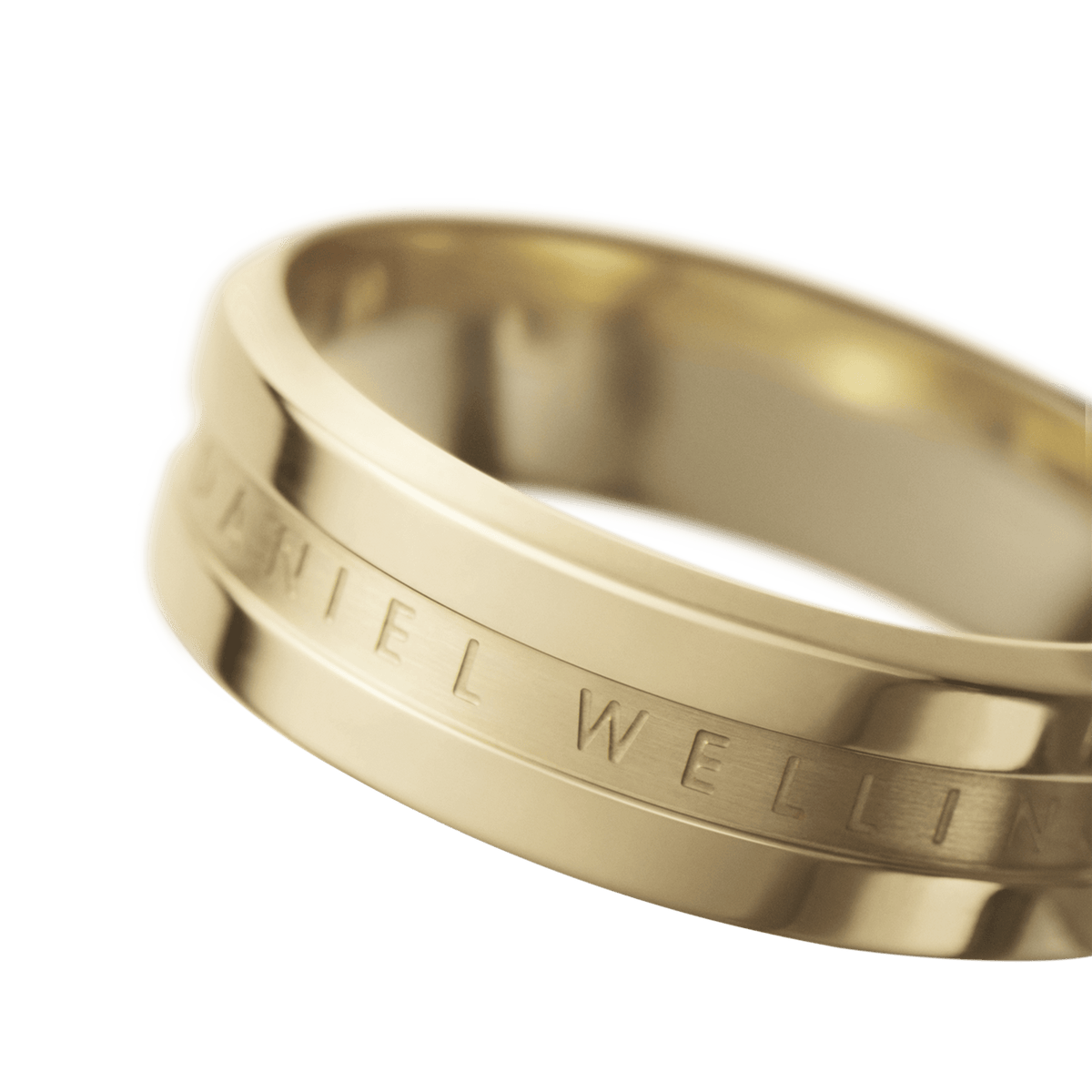 Close-up of the Elan Ring Gold, showcasing its polished gold finish, smooth band, and the engraved Daniel Wellington logo for a refined, minimalist style.