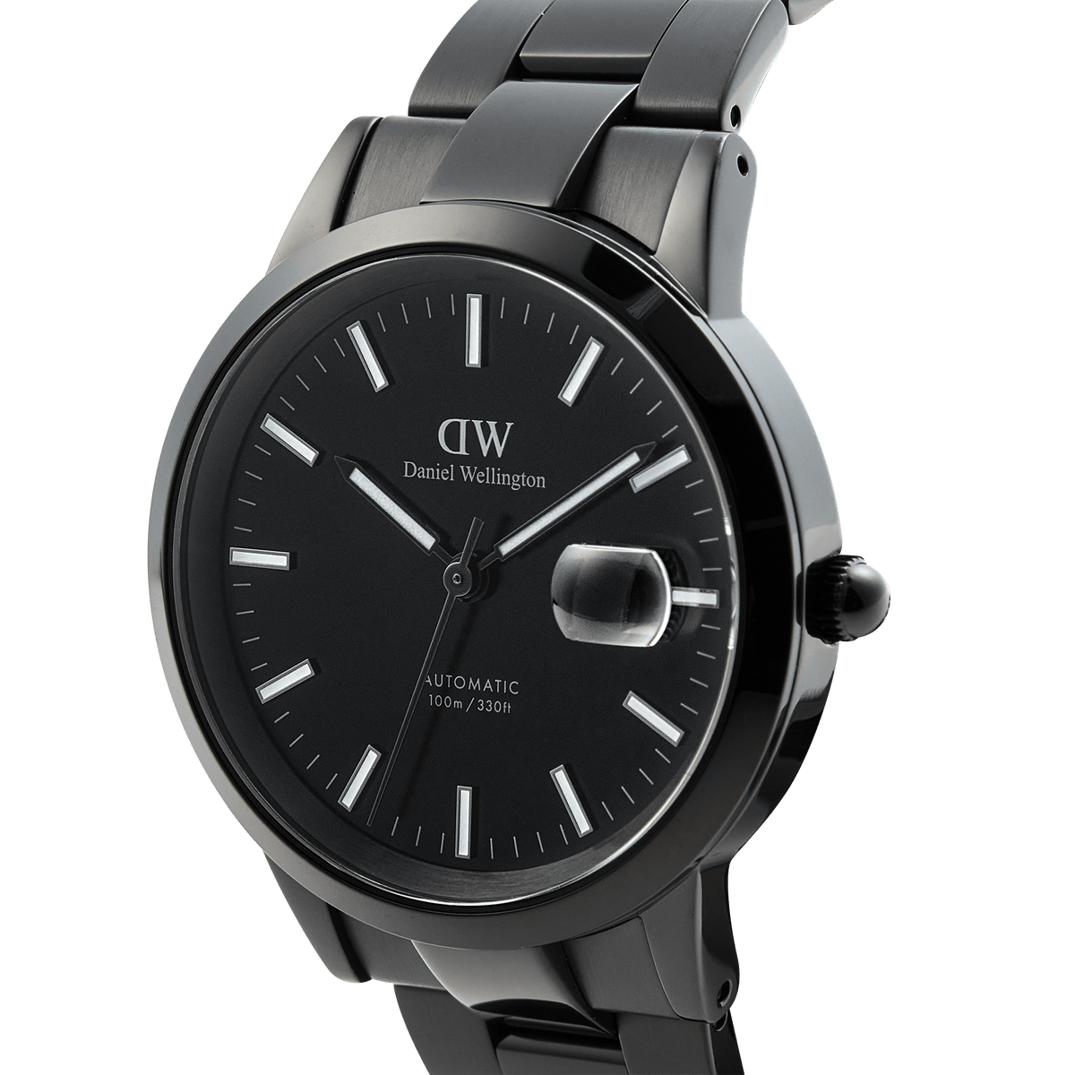 Close-up of the Daniel Wellington Iconic Link Automatic Black watch showing its glossy black enamel dial, luminous markers, magnified date window, and stainless steel bracelet.