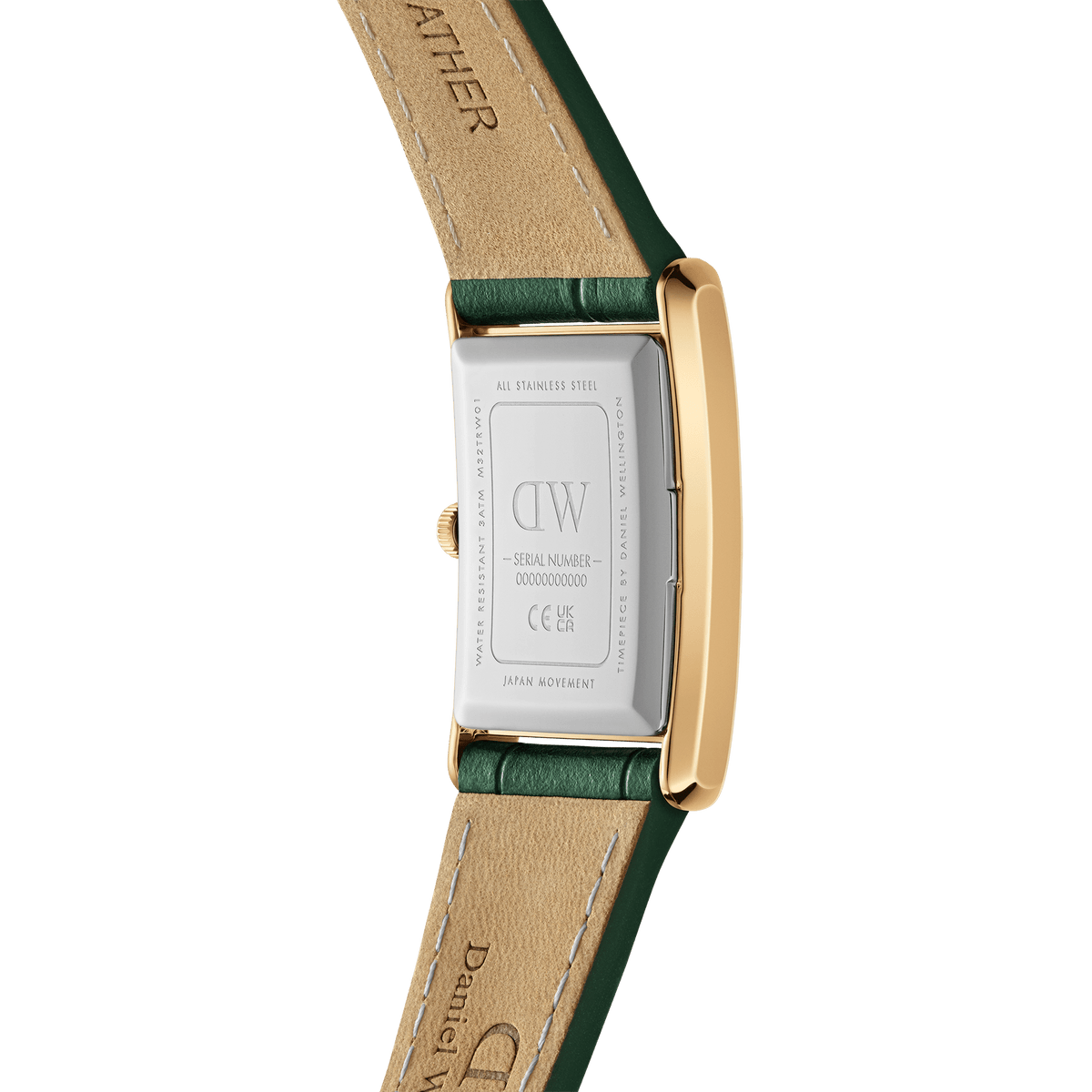 Back view of rectangular gold women’s watch with green crocodile-embossed leather strap and engraved stainless steel case.