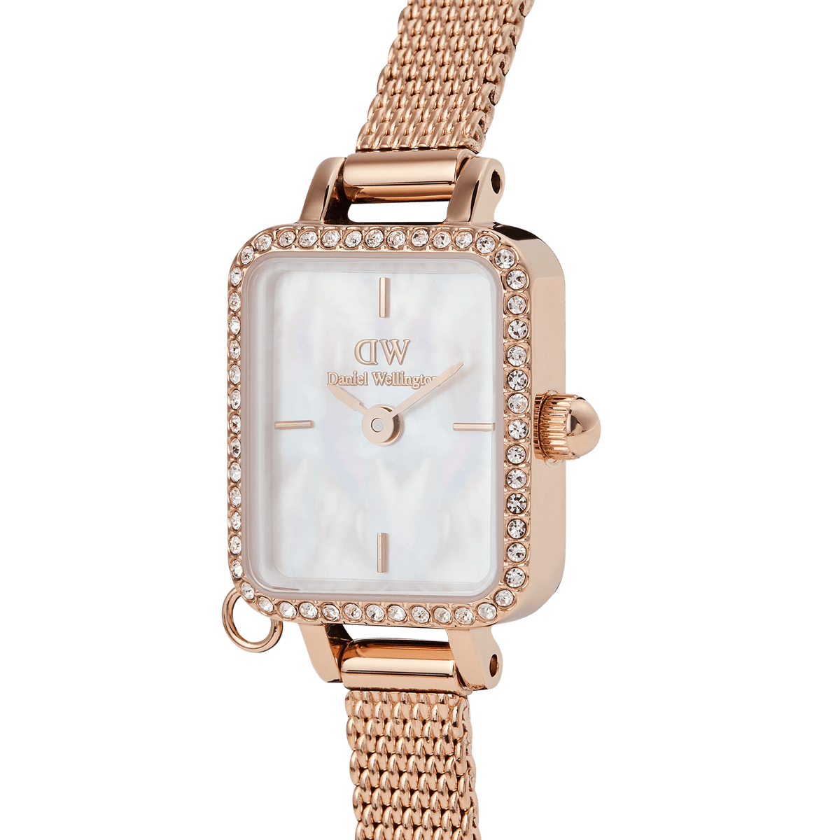 Close-up of the Quadro Mini Crystal Zodiac Melrose watch, showcasing its rose gold mesh strap, rectangular crystal-set bezel, and shimmering white mother of pearl dial with minimalist hour markers.