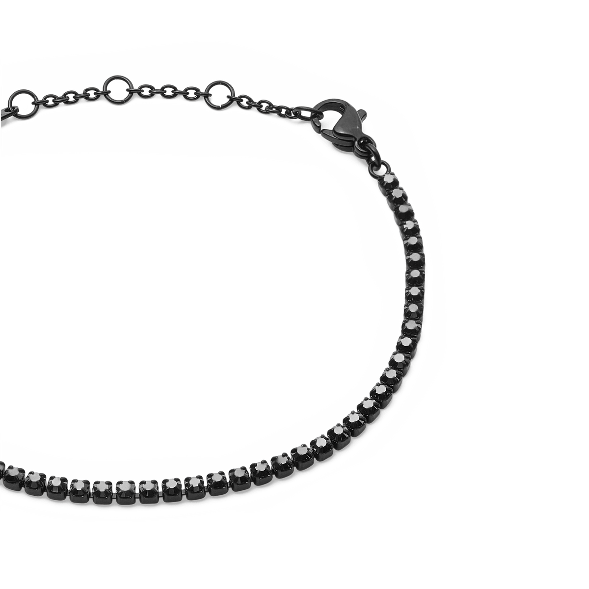 Close-up of the Black Crystal Tennis Bracelet showing individually set Preciosa black crystals in a sleek black stainless steel claw setting with an adjustable lobster clasp.